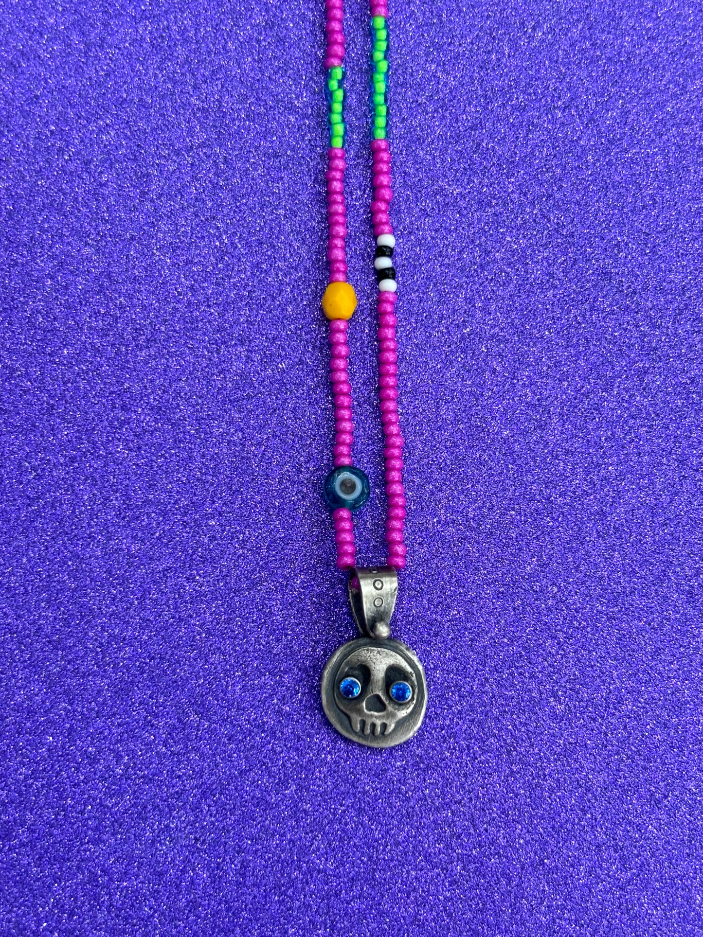 Little Skullie with Blue Spinel Eyes