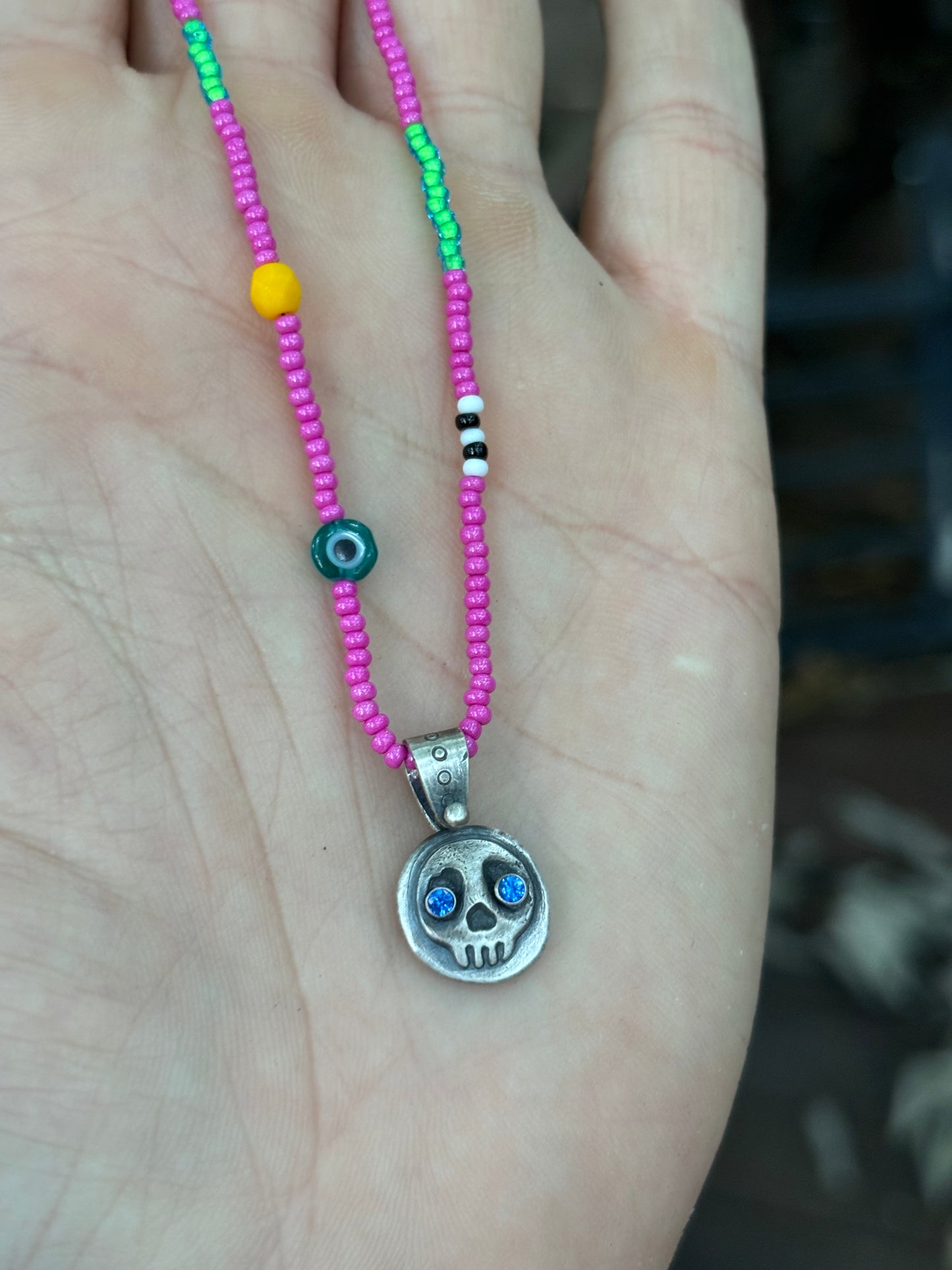 Little Skullie with Blue Spinel Eyes