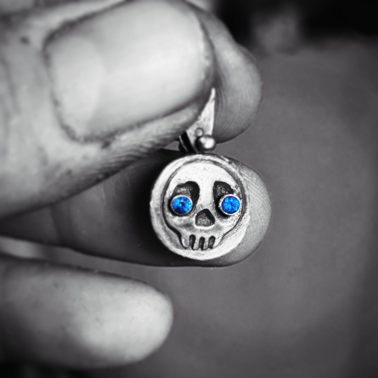 Little Skullie with Blue Spinel Eyes